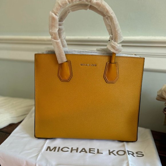 Michael Kors Handbags - NEW W/ TAGS RETAILS $328
MICHAEL KORS MARIGOLD ACCORDION LARGE CONVERTIBLE TOTE